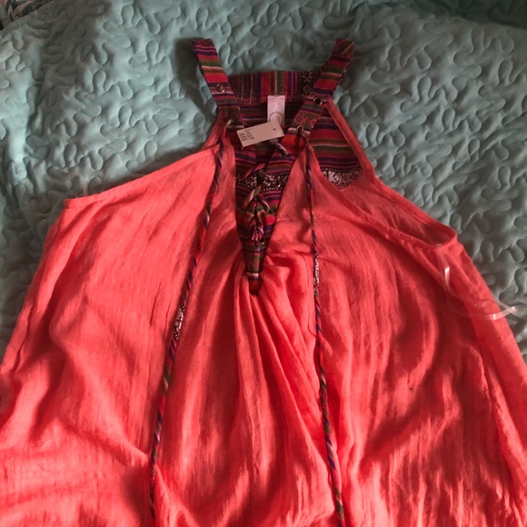 Tops - Peach colored tank top with zarape accent.